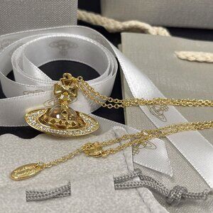 Vivienne Westwood gold chain Saturn pendant necklace